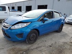 Salvage cars for sale from Copart Jacksonville, FL: 2013 Ford Fiesta SE