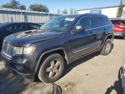 Salvage SUVs for sale at auction: 2013 Jeep Grand Cherokee Laredo