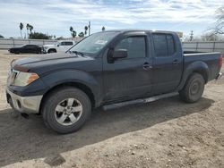 Salvage trucks for sale at Mercedes, TX auction: 2010 Nissan Frontier Crew Cab SE