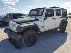 Salvage cars for sale at West Palm Beach, FL auction: 2012 Jeep Wrangler Unlimited Sport