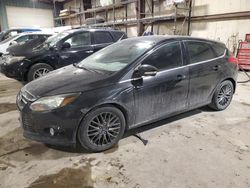 Salvage cars for sale at Eldridge, IA auction: 2013 Ford Focus Titanium