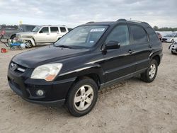 Salvage cars for sale at Houston, TX auction: 2009 KIA Sportage LX