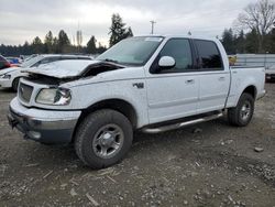 Salvage SUVs for sale at auction: 2001 Ford F150 Supercrew