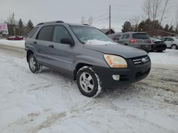 Salvage cars for sale from Copart Ottawa, ON: 2007 KIA Sportage EX