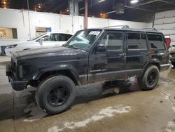 Salvage cars for sale from Copart Blaine, MN: 1999 Jeep Cherokee Sport