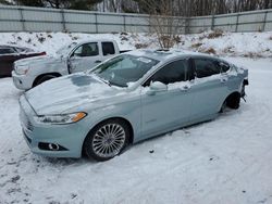 Salvage cars for sale at Davison, MI auction: 2014 Ford Fusion Titanium HEV