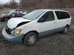 Salvage cars for sale from Copart Marlboro, NY: 1999 Toyota Sienna LE