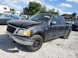 Salvage cars for sale at Opa Locka, FL auction: 2001 Ford F150 Supercrew