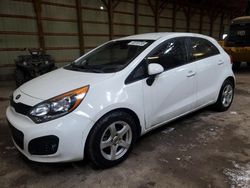 Salvage cars for sale at London, ON auction: 2013 KIA Rio LX