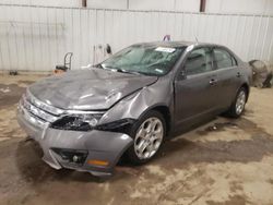 Salvage cars for sale at Lansing, MI auction: 2011 Ford Fusion SE