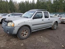 Salvage cars for sale at Graham, WA auction: 2002 Nissan Frontier Crew Cab XE