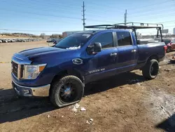 Salvage trucks for sale at Colorado Springs, CO auction: 2016 Nissan Titan XD SL