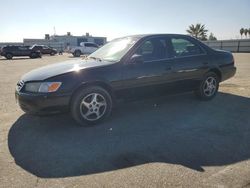 Salvage cars for sale from Copart Bakersfield, CA: 2001 Toyota Camry CE