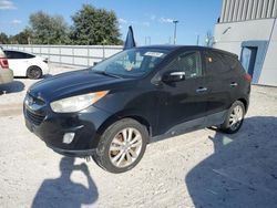 Salvage cars for sale at Apopka, FL auction: 2011 Hyundai Tucson GLS