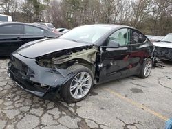 Salvage cars for sale at auction: 2024 Tesla Model Y