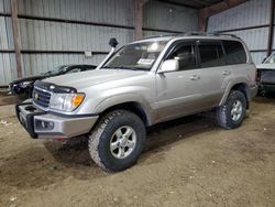 Salvage cars for sale at Houston, TX auction: 1999 Toyota Land Cruiser