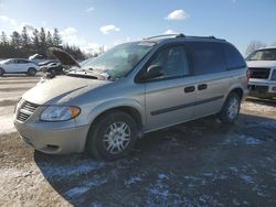 Salvage cars for sale from Copart Ontario Auction, ON: 2005 Dodge Caravan SE