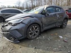 Salvage cars for sale at auction: 2022 Toyota C-HR XLE