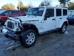 Jeep Wrangler salvage cars for sale: 2012 Jeep Wrangler Unlimited Sahara