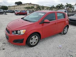 Salvage cars for sale at Opa Locka, FL auction: 2013 Chevrolet Sonic LT