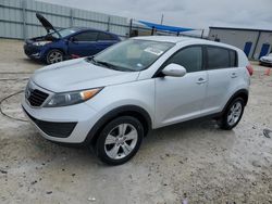 Salvage cars for sale at Arcadia, FL auction: 2011 KIA Sportage LX