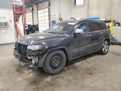 Salvage SUVs for sale at auction: 2014 Jeep Grand Cherokee Overland