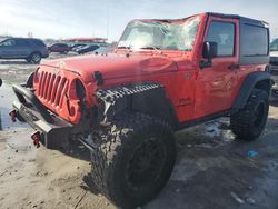 Salvage SUVs for sale at auction: 2013 Jeep Wrangler Sport