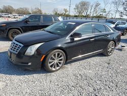 Flood-damaged cars for sale at auction: 2014 Cadillac XTS