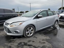 Salvage cars for sale from Copart Miami, FL: 2014 Ford Focus SE