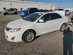 Salvage cars for sale at Farr West, UT auction: 2012 Toyota Camry Hybrid