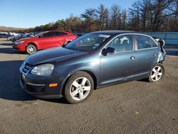 Volkswagen salvage cars for sale: 2009 Volkswagen Jetta SE