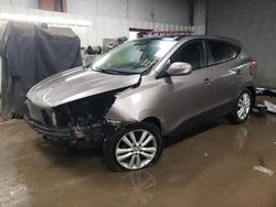 Salvage cars for sale at Elgin, IL auction: 2011 Hyundai Tucson GLS