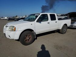 Salvage cars for sale from Copart Bakersfield, CA: 2004 Nissan Frontier Crew Cab XE V6