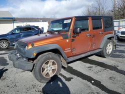 Jeep salvage cars for sale: 2010 Jeep Wrangler Unlimited Sport