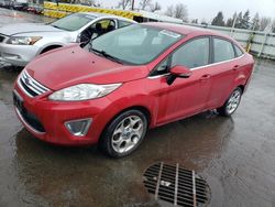 Salvage cars for sale at Woodburn, OR auction: 2011 Ford Fiesta SEL