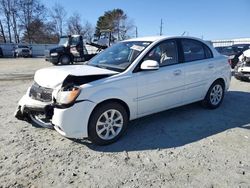 Salvage cars for sale from Copart Mebane, NC: 2011 KIA Rio Base