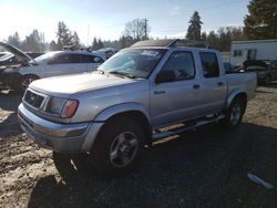 Salvage cars for sale from Copart Graham, WA: 2000 Nissan Frontier Crew Cab XE