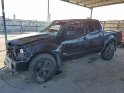 Salvage trucks for sale at Anthony, TX auction: 2010 Nissan Frontier Crew Cab SE