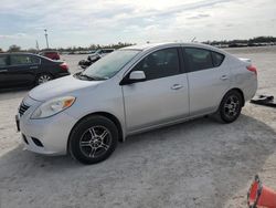 Salvage cars for sale from Copart Arcadia, FL: 2013 Nissan Versa S