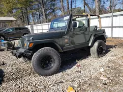 Salvage cars for sale at Austell, GA auction: 1998 Jeep Wrangler / TJ Sahara