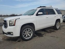 Salvage cars for sale from Copart Fresno, CA: 2016 GMC Yukon SLT