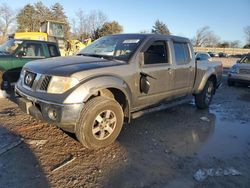 Salvage cars for sale from Copart Madisonville, TN: 2008 Nissan Frontier Crew Cab LE