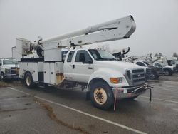 Salvage trucks for sale at Woodhaven, MI auction: 2011 Ford F750 Super Duty