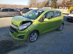 Salvage cars for sale at auction: 2013 Chevrolet Spark 1LT