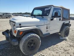 Salvage cars for sale from Copart Cleveland: 2000 Jeep Wrangler / TJ Sport