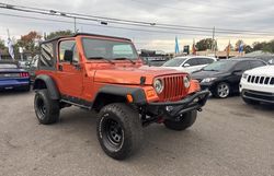 Salvage cars for sale from Copart Orlando, FL: 2001 Jeep Wrangler / TJ Sport