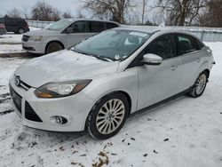 Salvage cars for sale at auction: 2012 Ford Focus Titanium