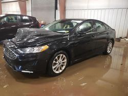 Salvage cars for sale at Lansing, MI auction: 2020 Ford Fusion SE