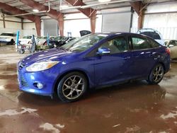 Salvage cars for sale at Lansing, MI auction: 2014 Ford Focus SE