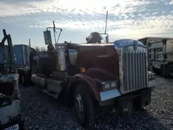 Salvage trucks for sale at Memphis, TN auction: 2009 Kenworth Construction W900